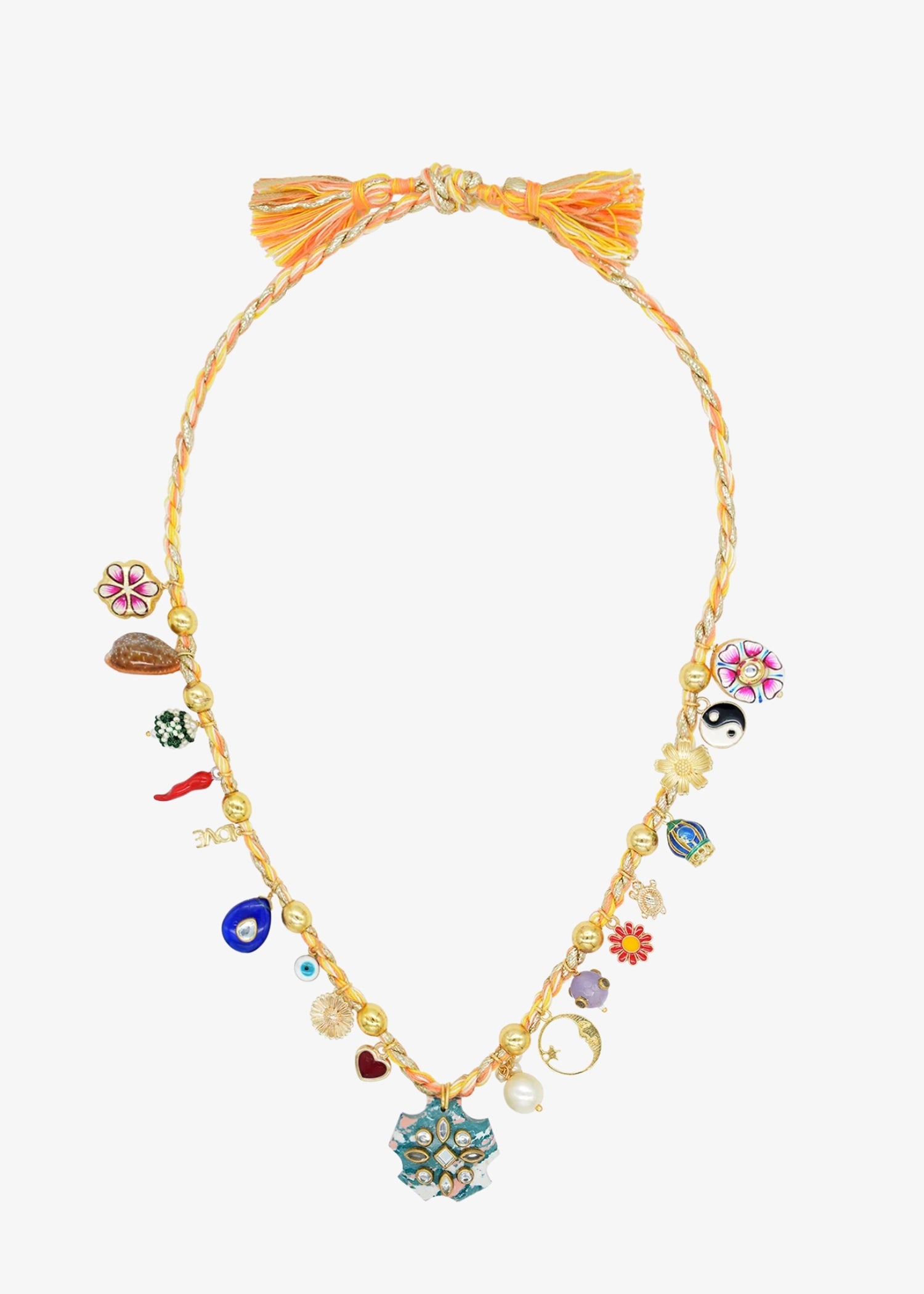 eaded necklace by Monoki with a braided tassel at the top and multiple colorful charm beads, including floral, and geometric