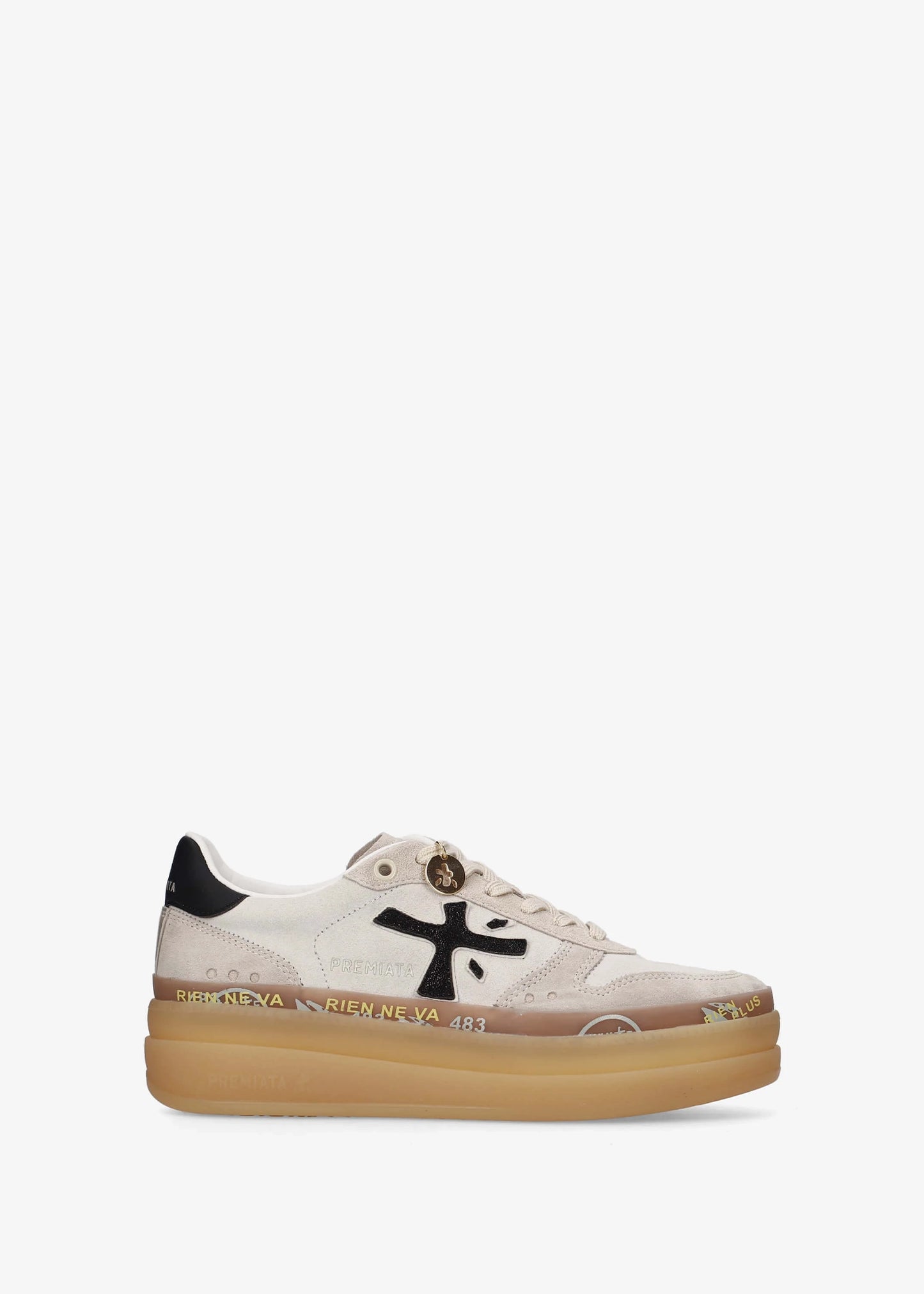 A low-top platform sneaker by Premiata, featuring a cream and beige suede and mesh upper, a black cross logo on the side, gold-tone hardware, and a thick tan gum sole.